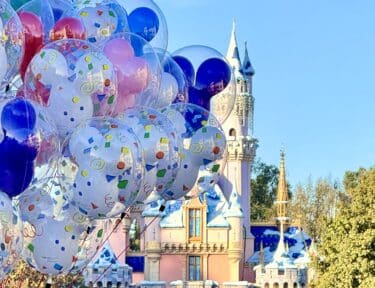 Disneyland Castle with Mickey Balloons