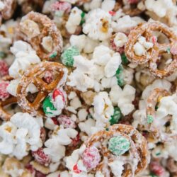 Close up Christmas crunch with pretzels, popcorn, and M&M's