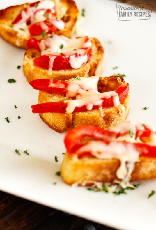 Red pepper bruschetta on a white tray