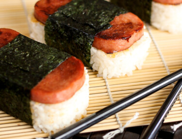 3 musubi parcels with chop sticks