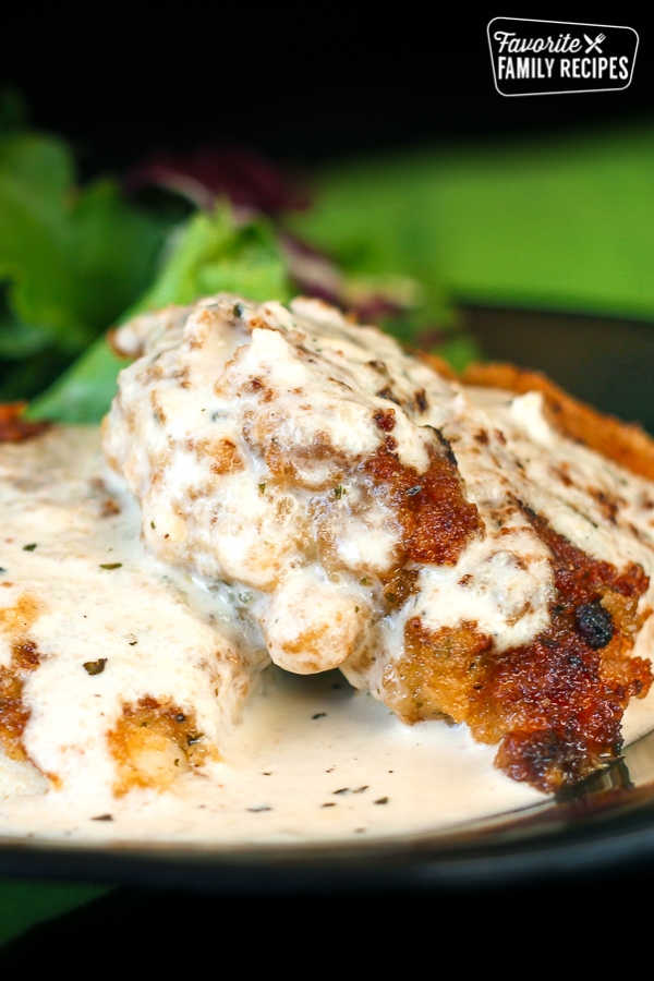 Parmesan Crusted Chicken In Basil Cream Sauce