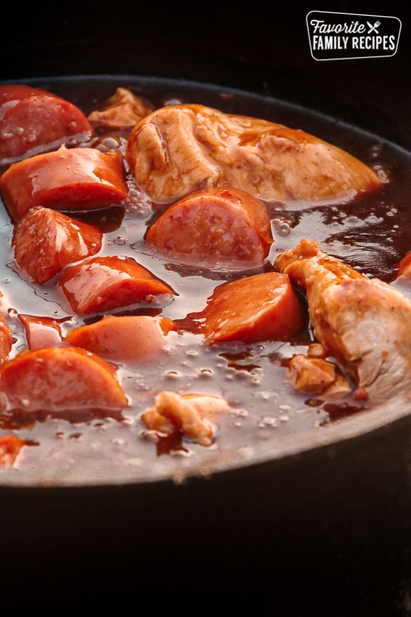 https://www.favfamilyrecipes.com/wp-content/uploads/2018/11/Dutch-Oven-Chicken-and-Sausage-2.jpg