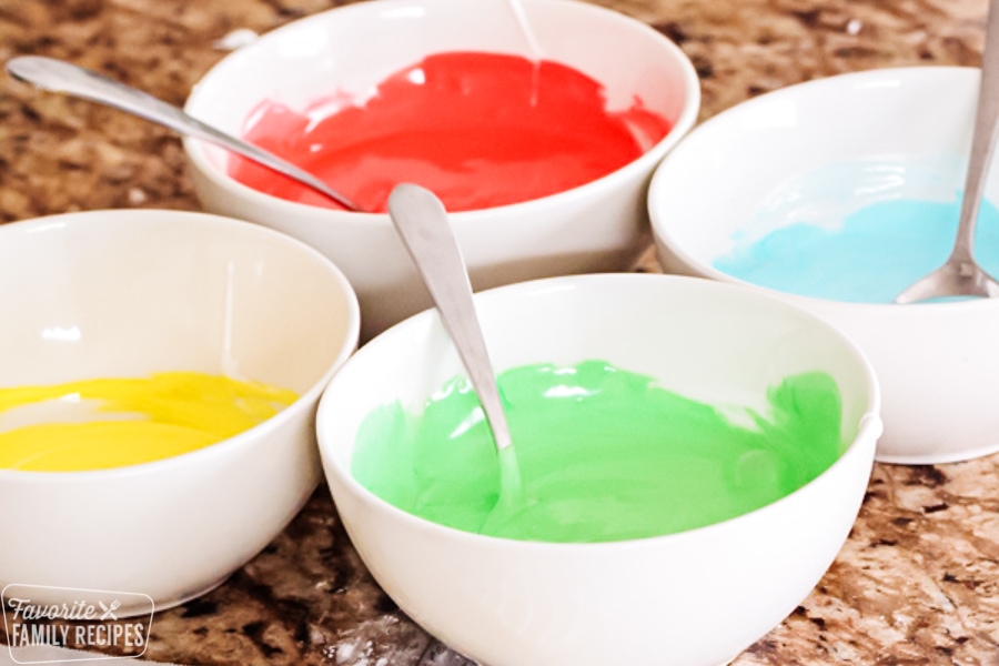 Royal icing for Christmas cookies in bowls