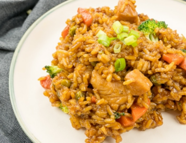 One pot teriyaki chicken on a white plate.