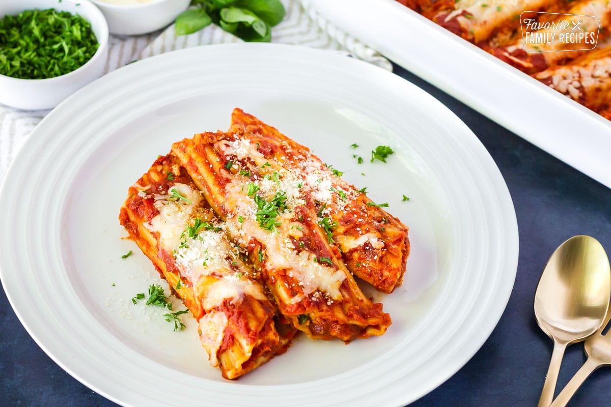 Side view of Cheese Manicotti on a plate.