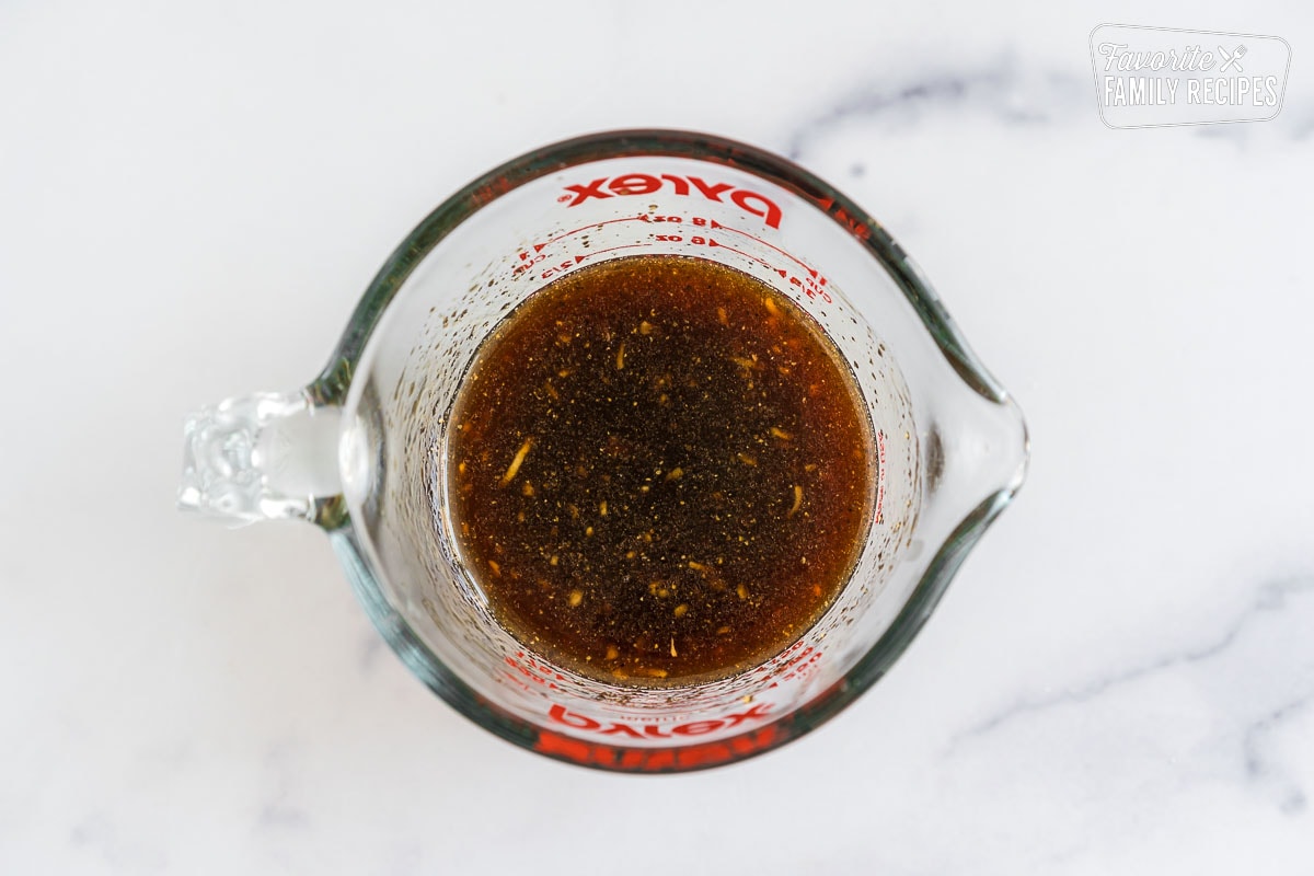 Egg Roll Bowl sauce in a glass measuring cup