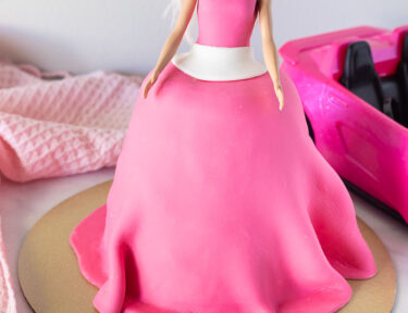 Decorated Barbie Cake with hot pink fondant.