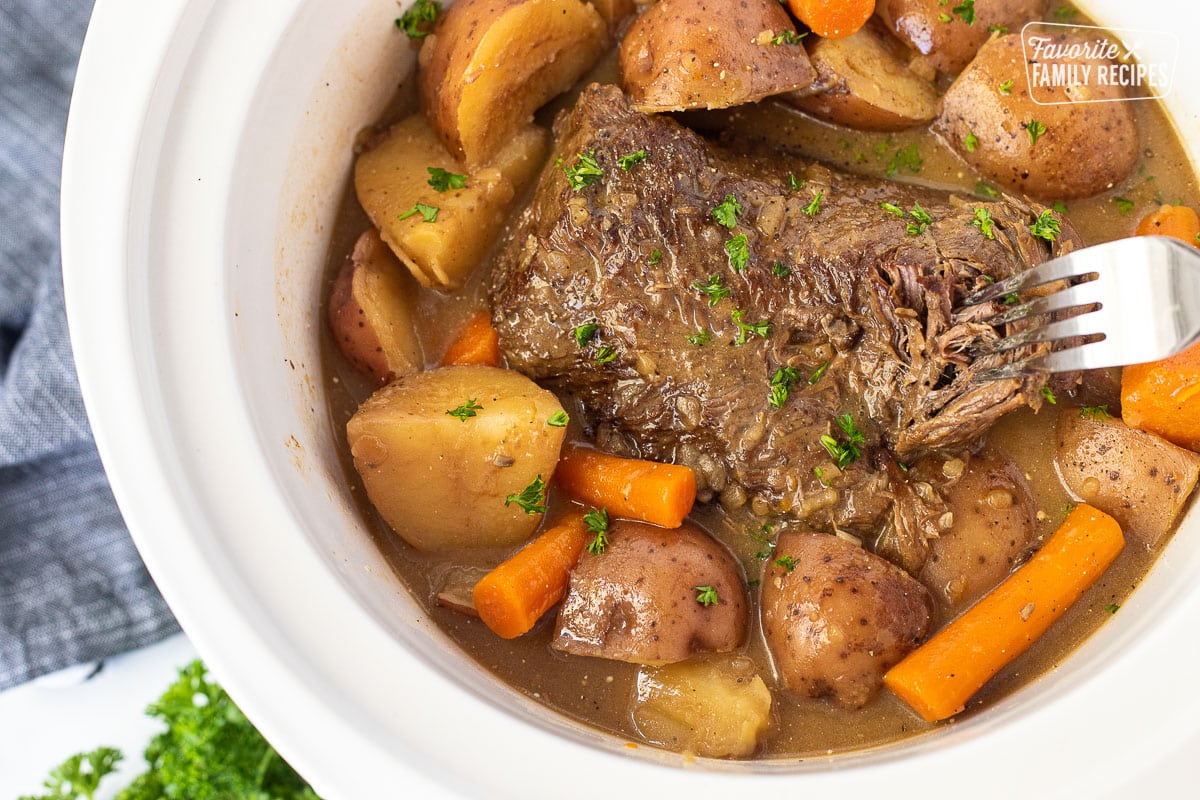 Slow Cooker Beef Roast with Potatoes and Carrots - The Toasty Kitchen