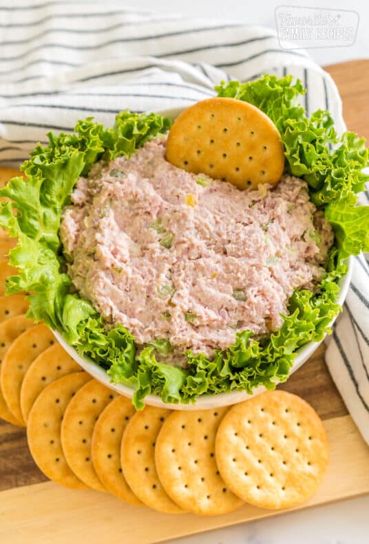 Ham salad in a bowl with lettuce and crackers