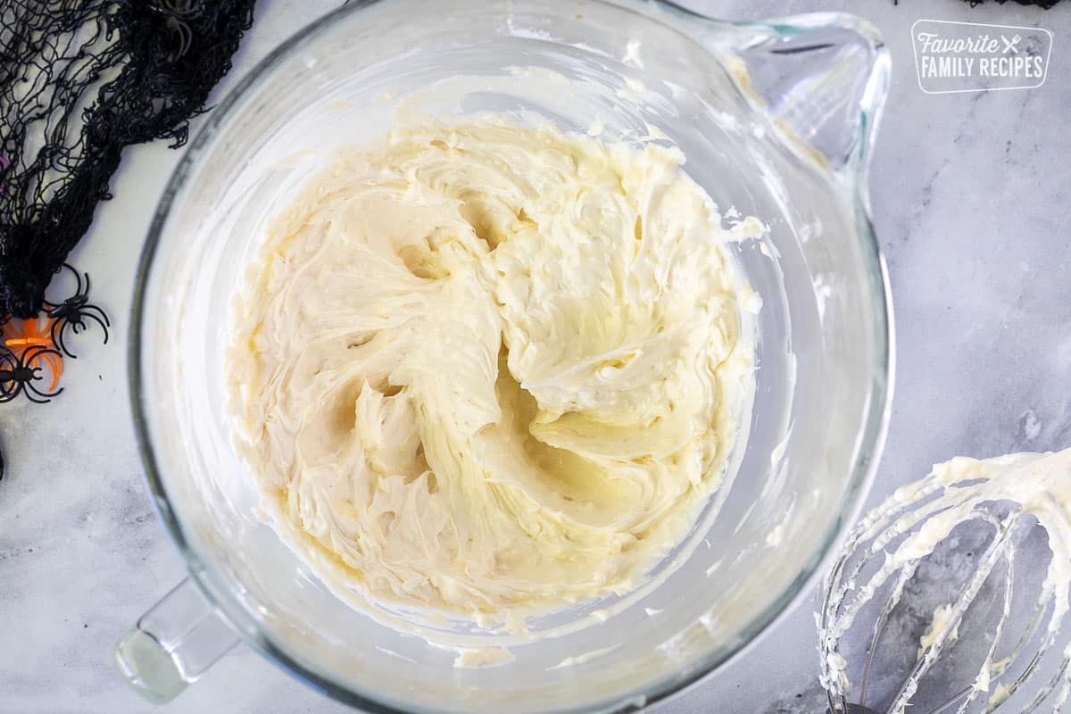 Mixing bowl with butter and cream cheese for Spider Cake Frosting.