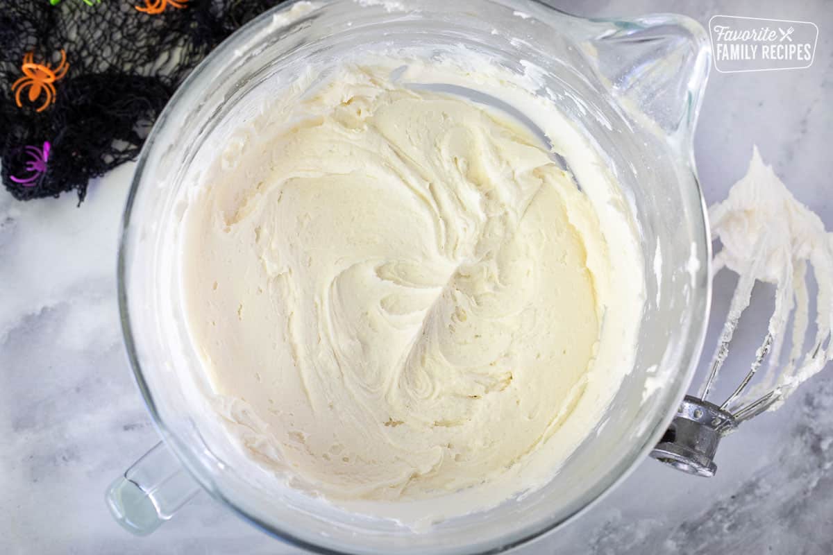 Mixing bowl with frosting for Spider Cake.