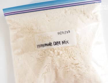 Homemade cake mix in a ziplock bag with a label.