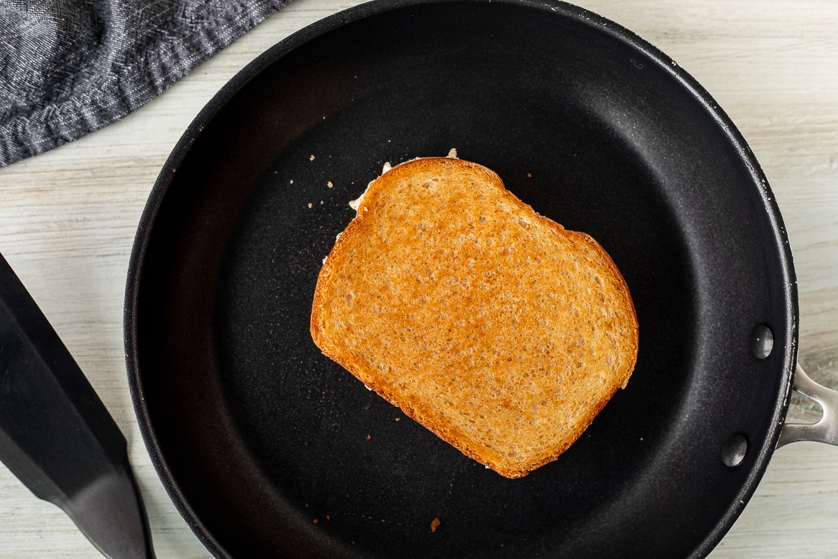 Skillet with golden Tuna Melt.