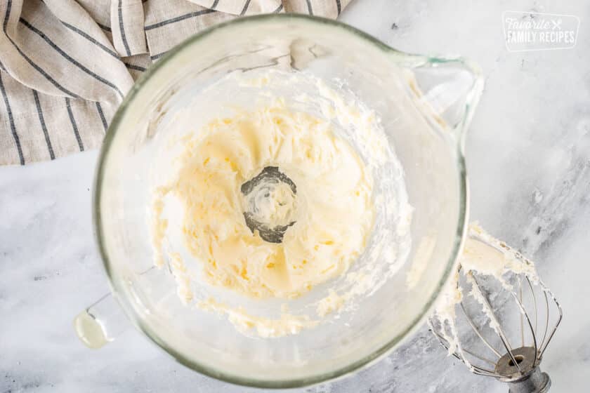 Mixing bowl with creamed butter and sugar.