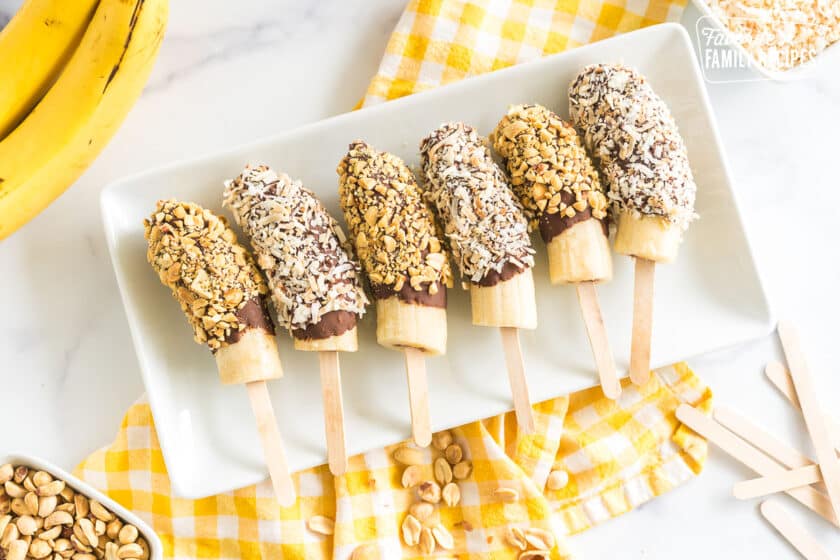 chocolate covered bananas on a plate