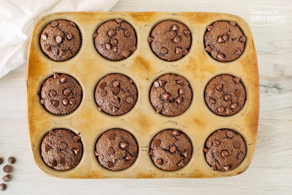 Baked Healthy Chocolate Chip Muffins in a cupcake baking pan.