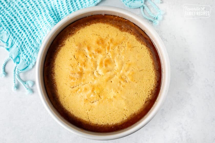 Baked pineapple upside down cake in a round pan.