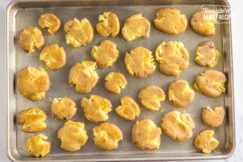 Boiled baby golds smashed onto a baking sheet