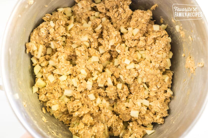 apple oatmeal cookie dough in a mixing bowl