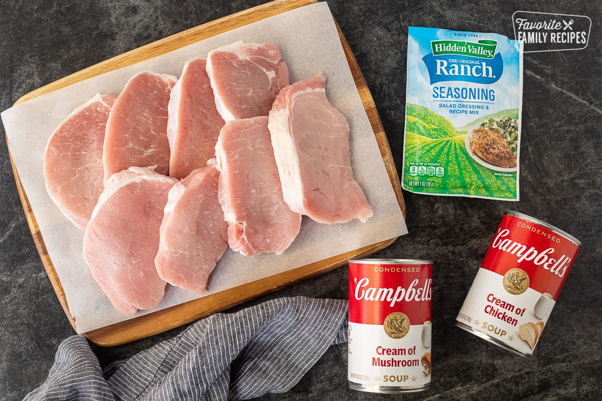 Ingredients to make Crock Pot Pork Chops including pork chops, Ranch seasoning packet, cream of mushroom soup and cream of chicken soup.