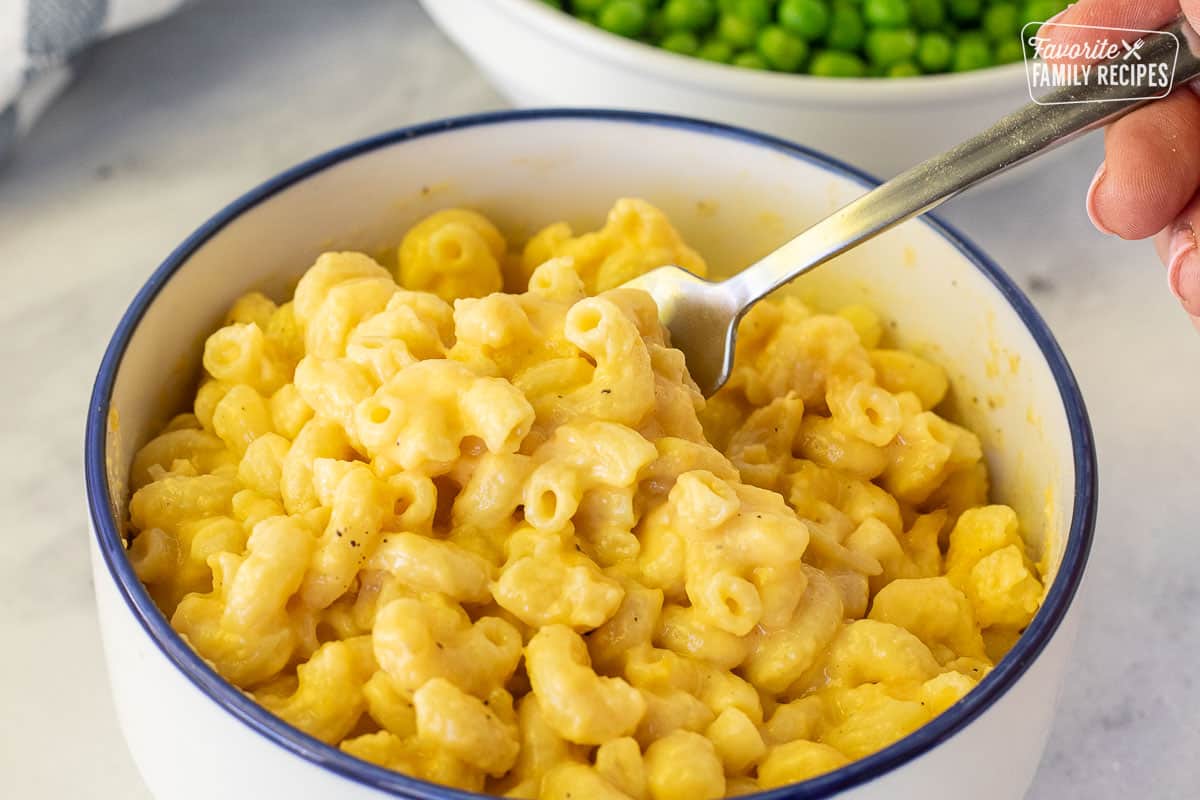 Fork in bowl of homemade Mac and cheese.