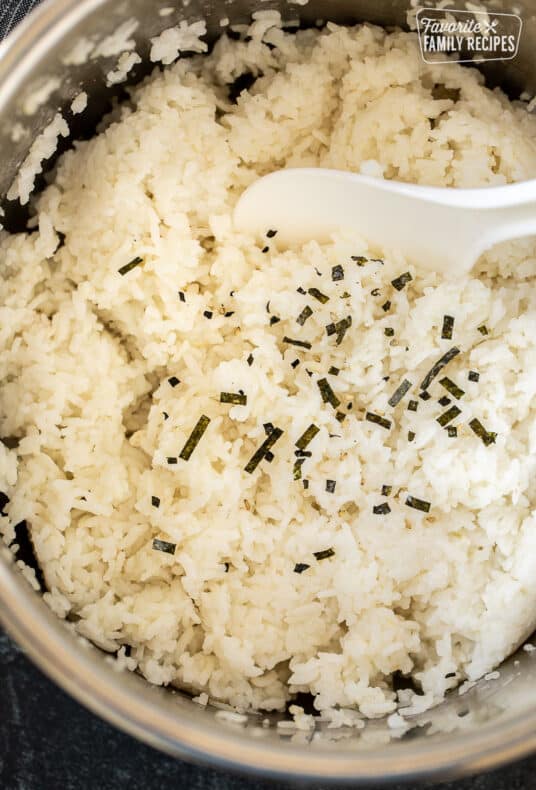 Sushi rice with a paddle in the instant pot.