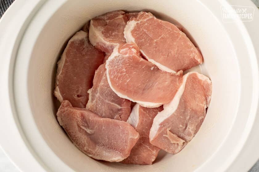 Raw pork chops in crock pot for crock pot pork chops recipe.