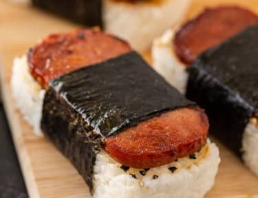 Close up of Spam Musubi Hawaiian snack with fried Spam.