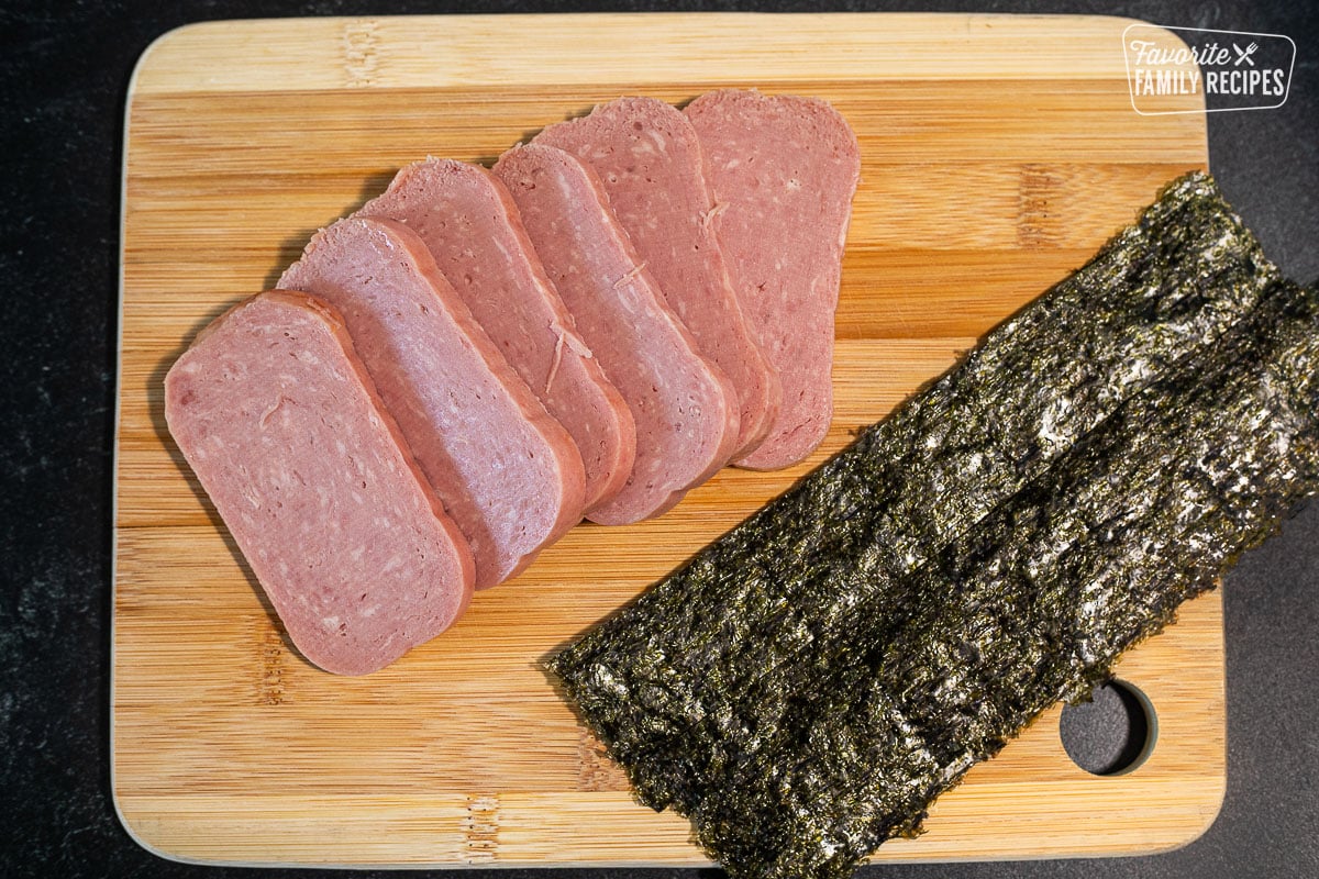 Spam Musubi ingredients: Sliced Spam and strips of Nori roasted seaweed.