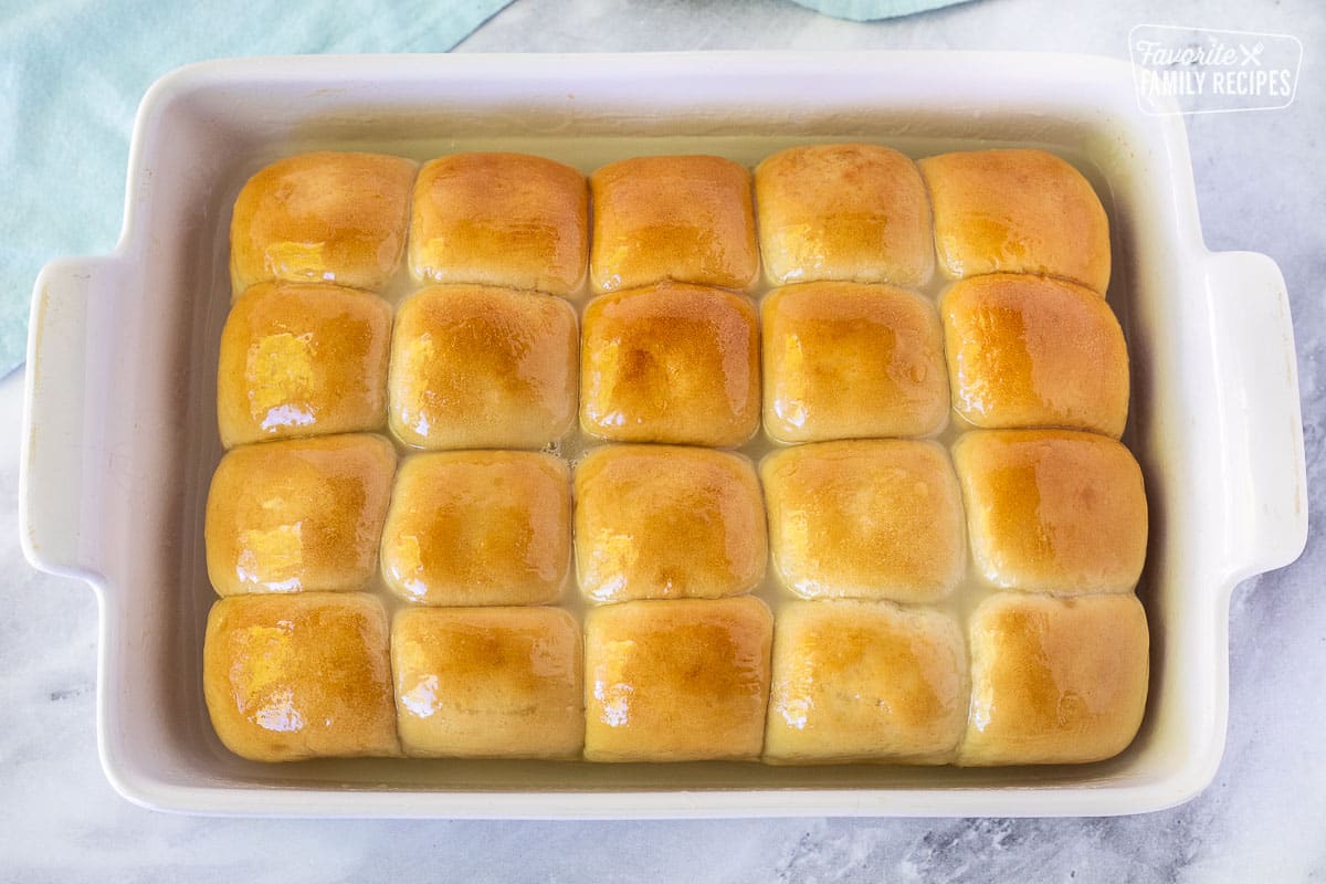 Baked Pani Popo in a baking dish.