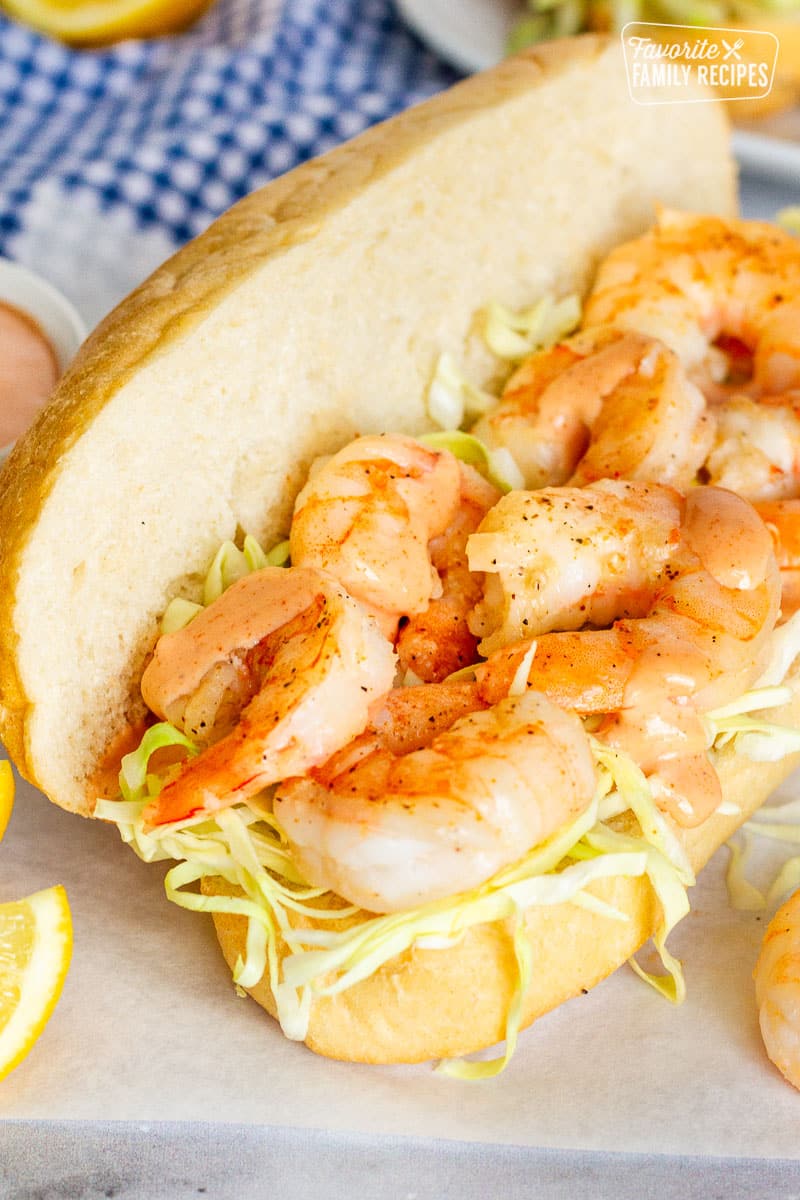 Shrimp Po'Boy Sandwich with cabbage and cajun sauce.