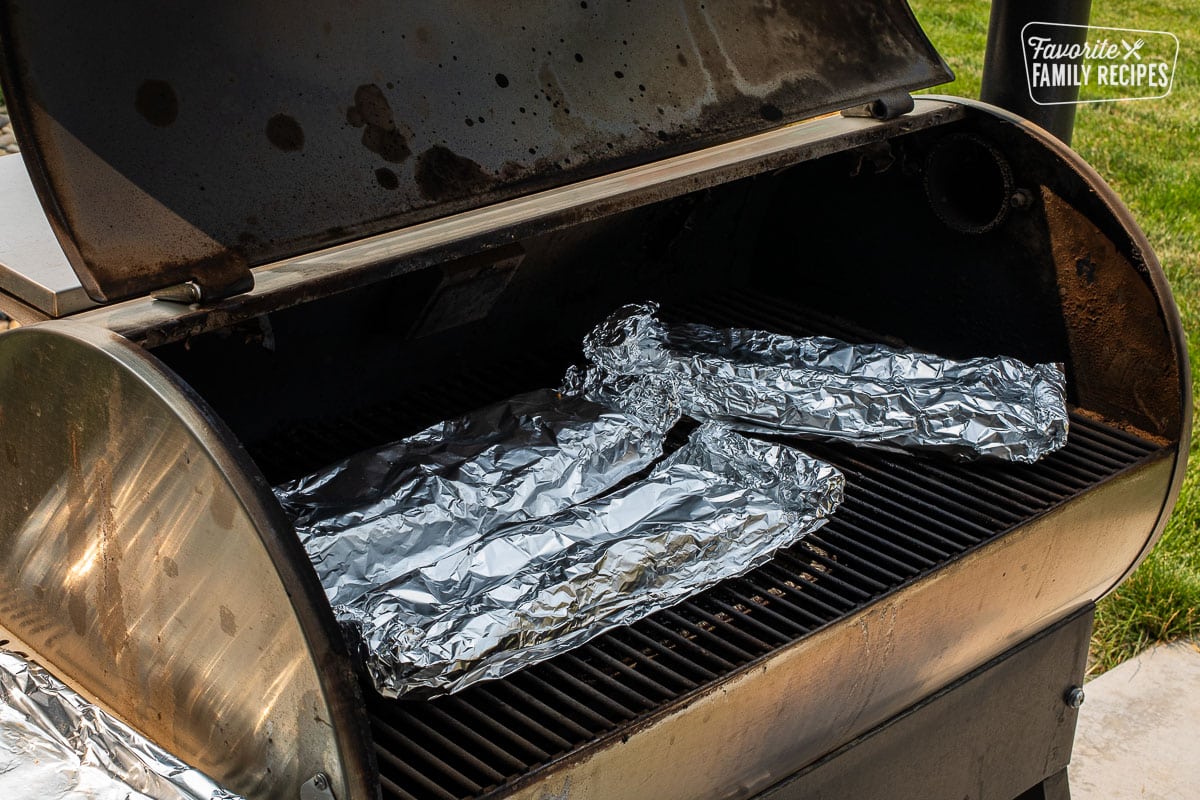 Smoked with three racks of ribs wrapped in foil.