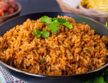 Large bowl of Mexican Rice with cilantro.