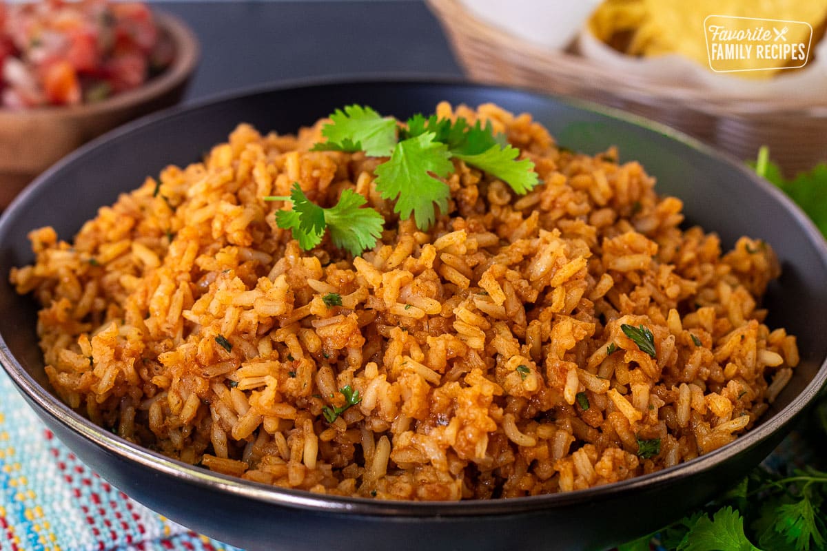 Homemade Mexican Rice with fluffy texture and cilantro garnish.