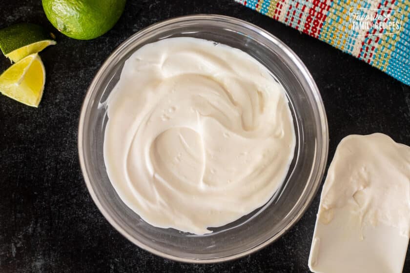 Small bowl with mixture of sour cream and mayonnaise.