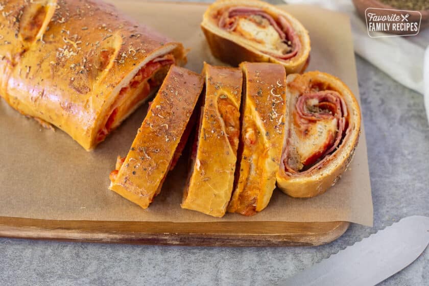 Slices of Stromboli on a cutting board.