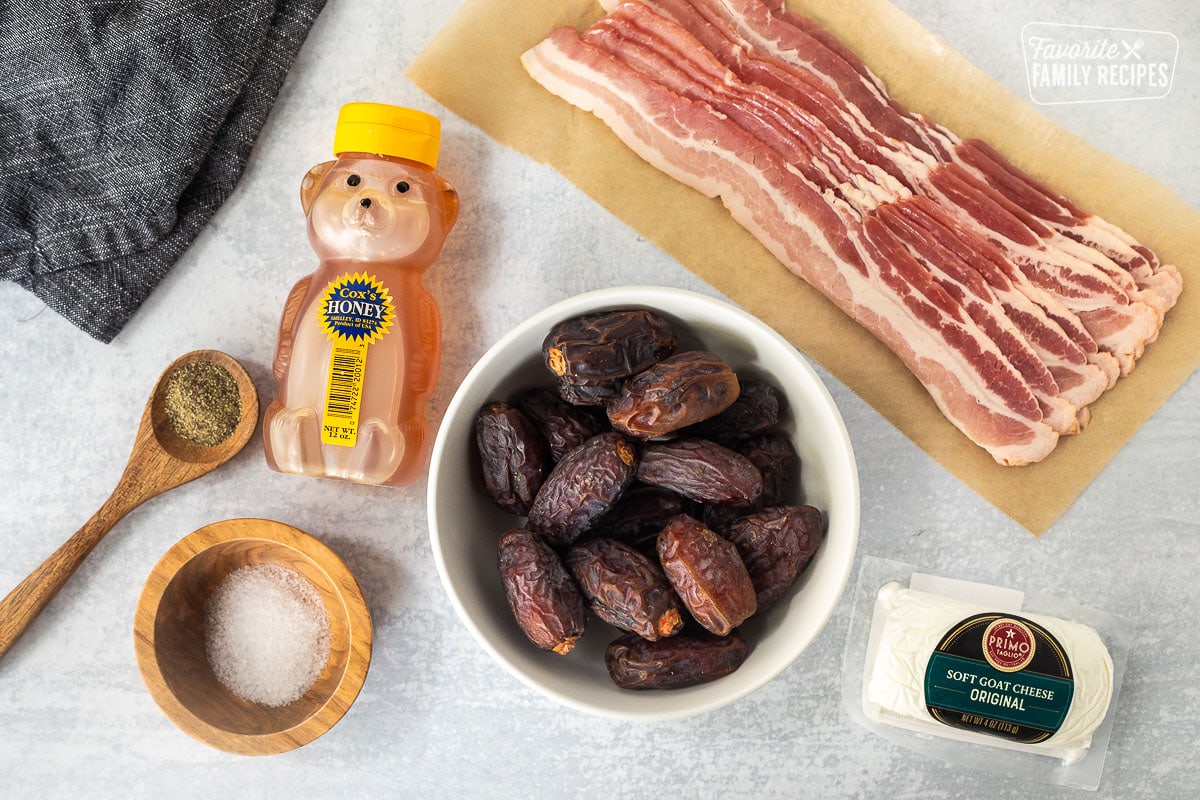 Ingredients to make Bacon Wrapped Dates Appetizer including bacon, salt, pepper, honey, Medjool dates and goat cheese.