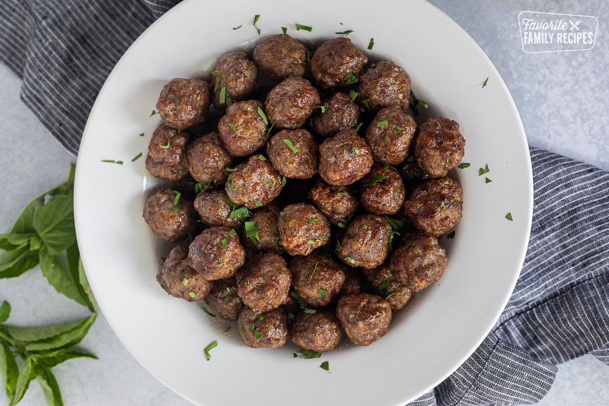 Bowl of Air Fryer Meatballs garnished.