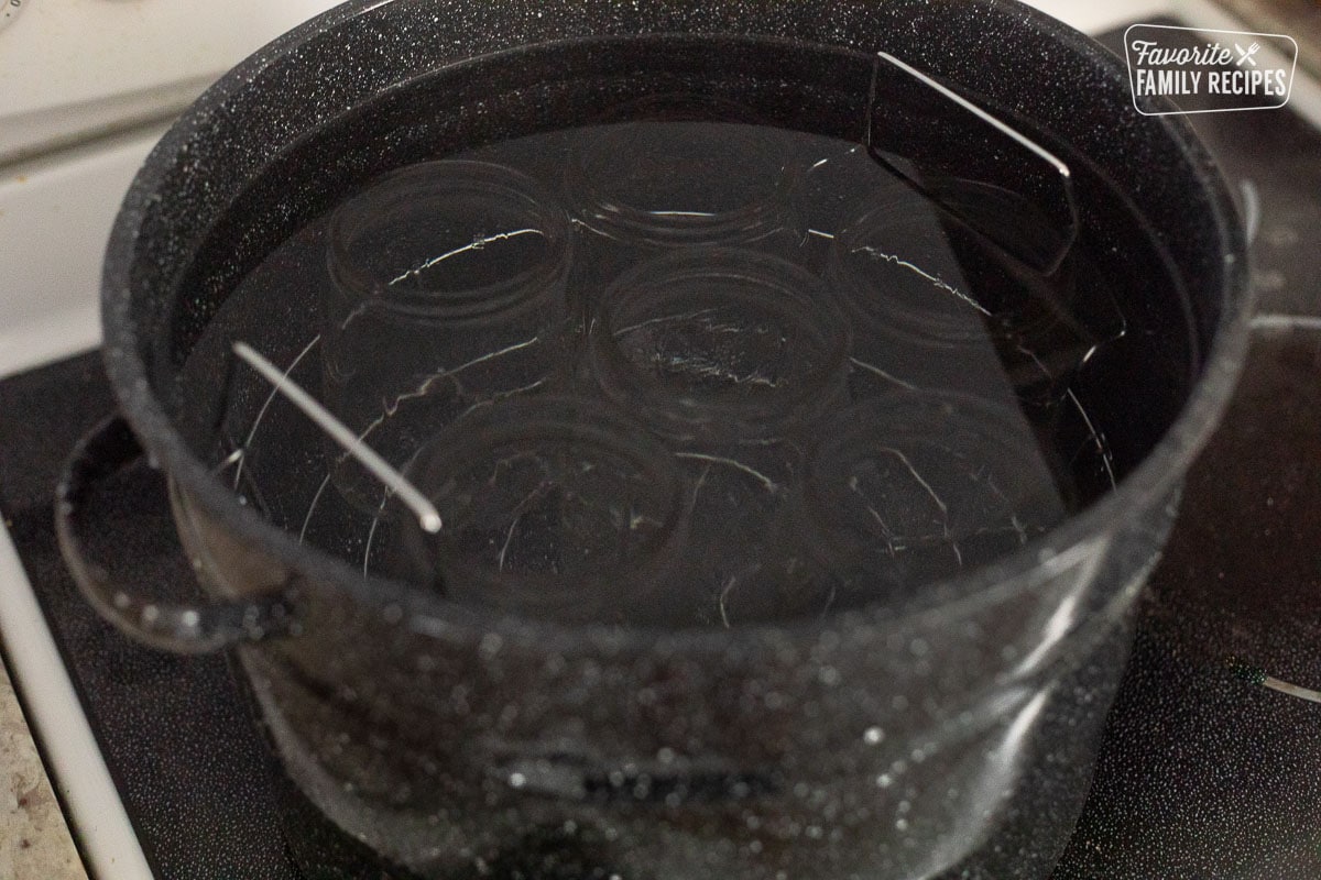 Canning jars in a canning pot.