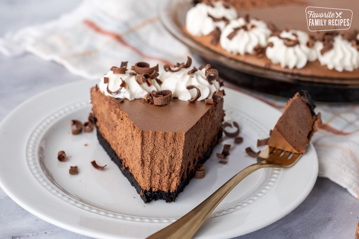 Fork cut into the Chocolate Satin Pie slice.