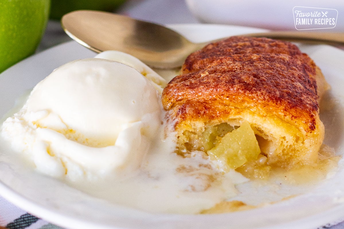 Apple Dumpling with a scoop of melty vanilla ice cream.