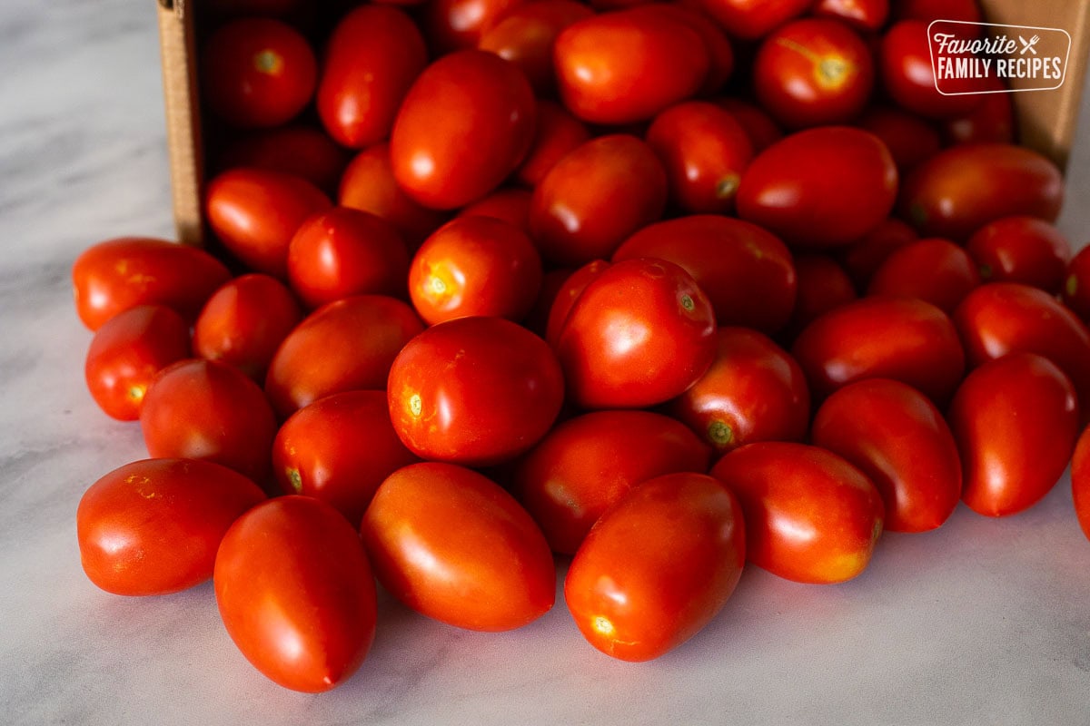 Box of Roma tomatoes.