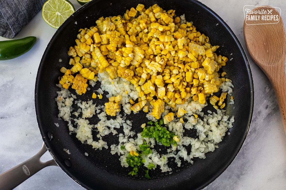 Skillet with grilled corn, onion and jalapeño.