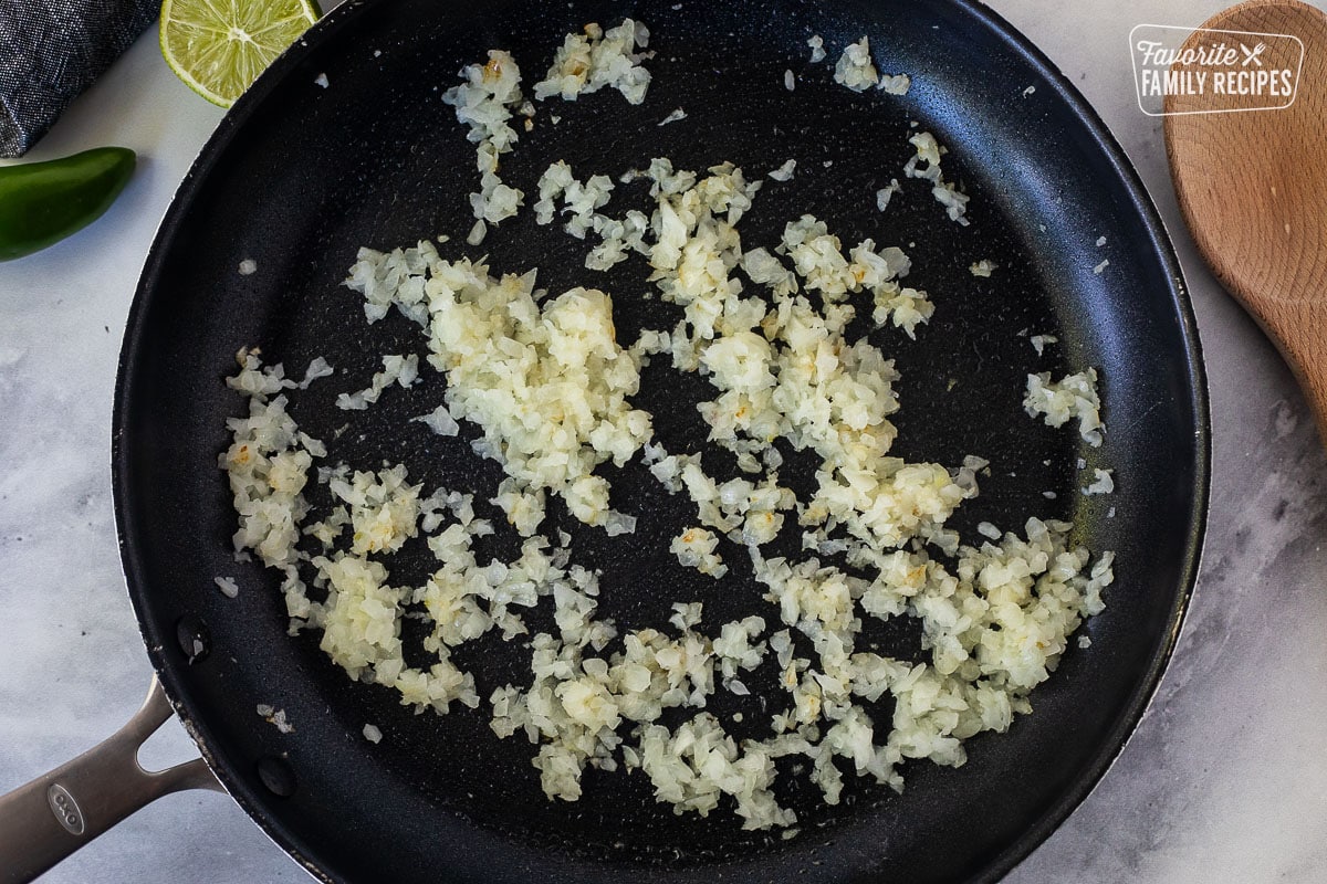 Skillet with grilled chopped onions.