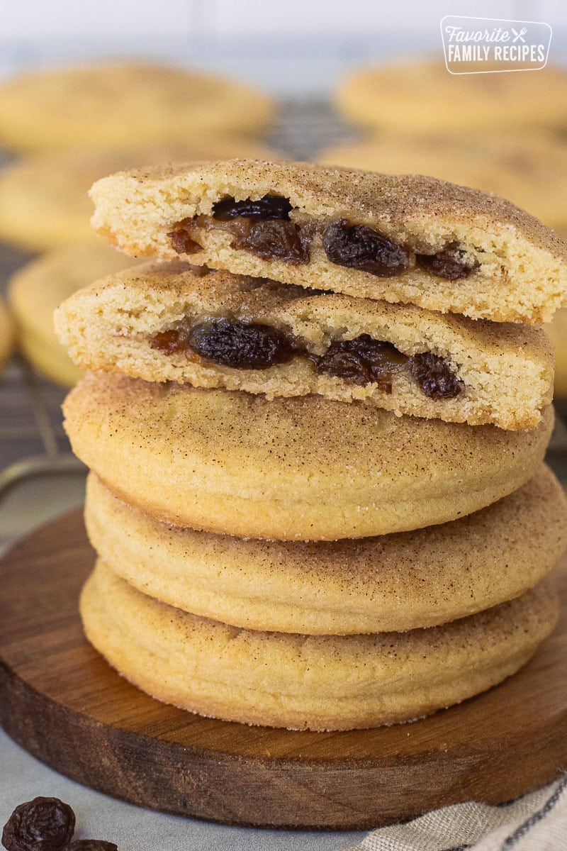 Raisin filled cookies stacked and cut in half.