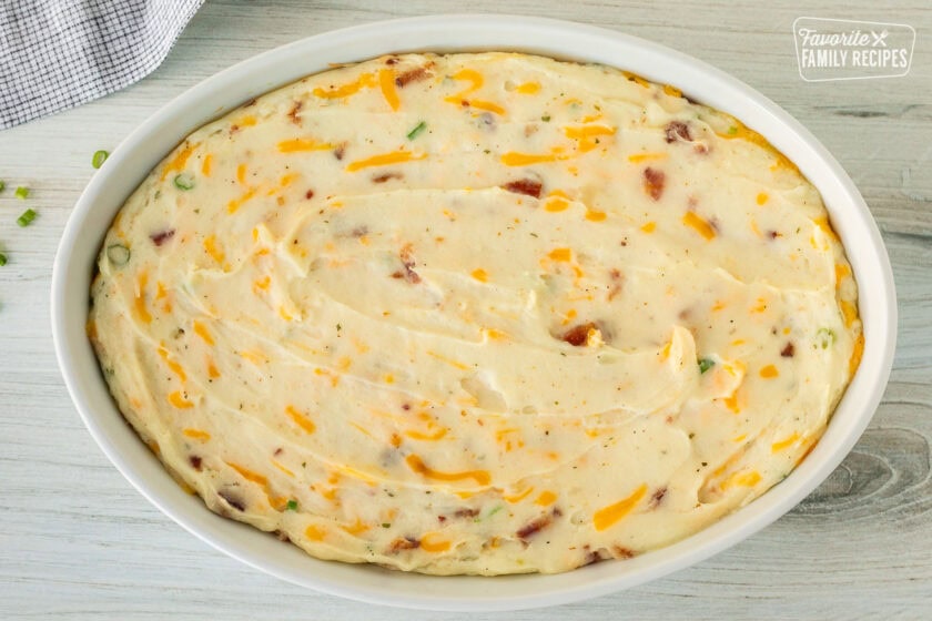 Baked baking dish of Loaded Mashed Potatoes.