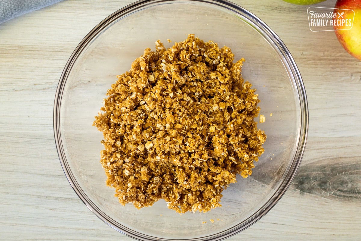 Glass bowl with crumble topping.