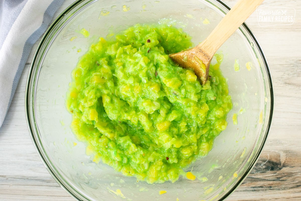 Mixing bowl with pistachio and crushed pineapple mixture.