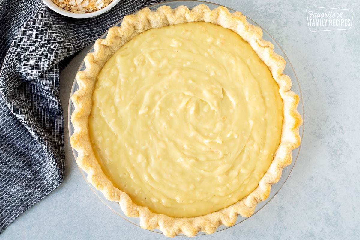 Filled Coconut Cream Pie in pie crust.