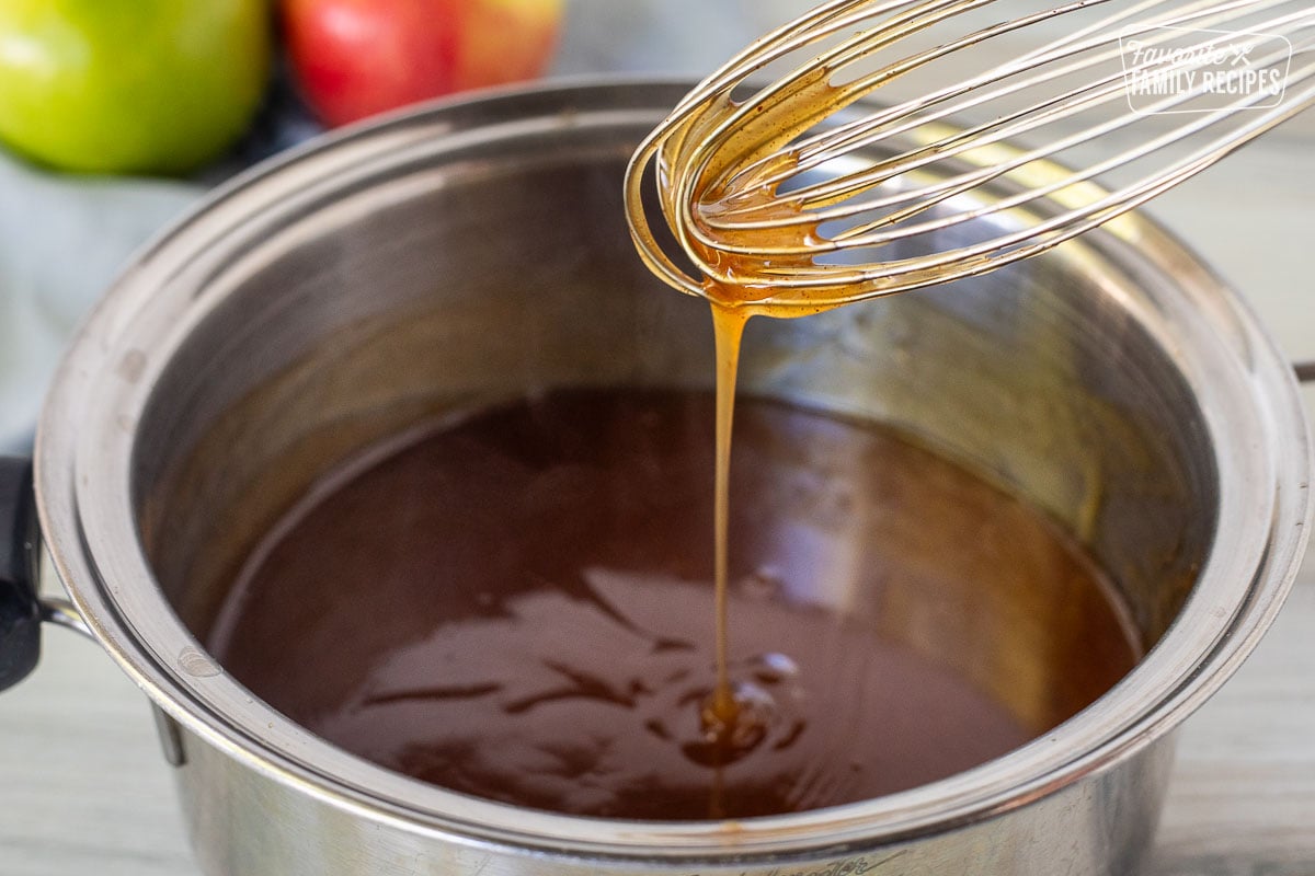 Whisk drizzling glaze for Apple Pie filling into a pan.